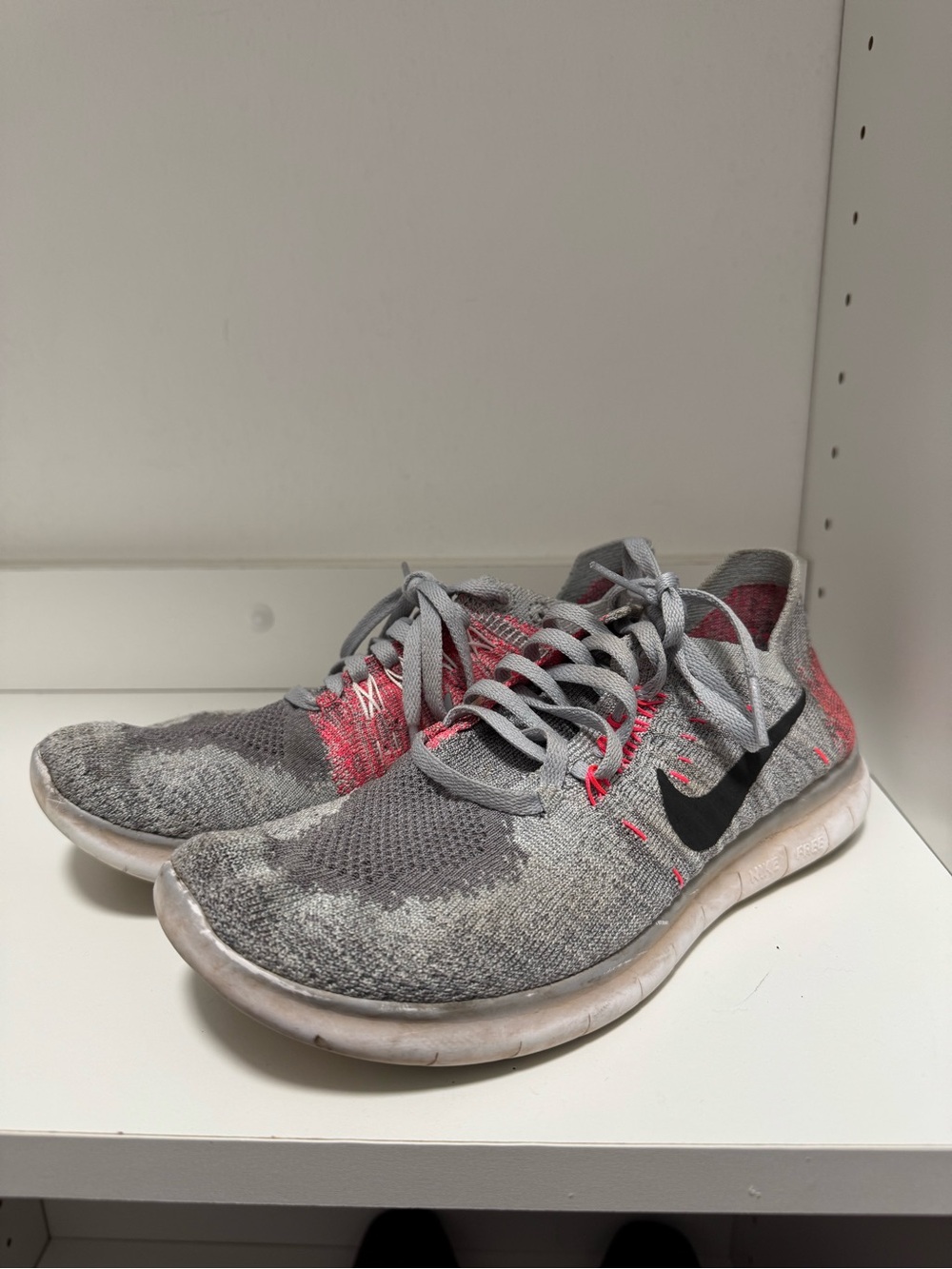 Nike Grey Flyknit Sneakers with Pink Details Size 5Y